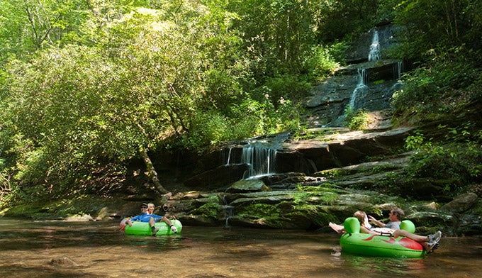 SM-Tom-Branch-tubing-CS_BrysonSwain_680 Float past Tom Branch Falls along Deep Creek's 2-mile tubing section.