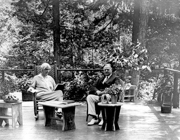 Shenandoah-HooversOnPorch_NPSPD_700 Herbert (right) and Lou Henry (left) Hoover on the porch at Rapidan Camp in Shenandoah National Park