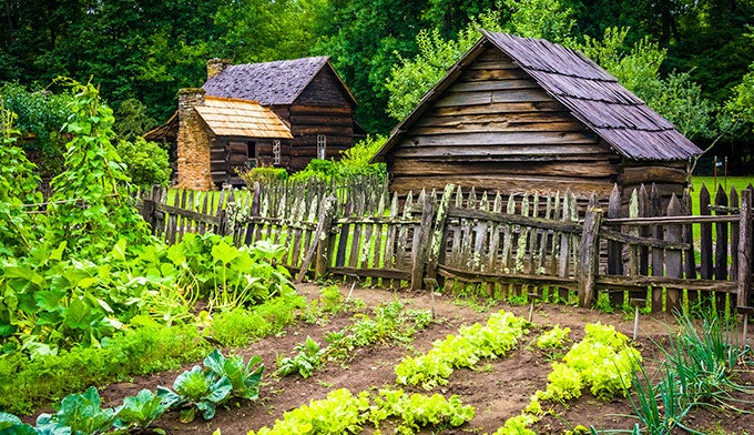 Smoky-MountainFarmMuseum-garden-OconalufteeValley_DP_680 The Mountain Farm Museum at Oconaluftee Valley inside Great Smoky Mountains National Park.