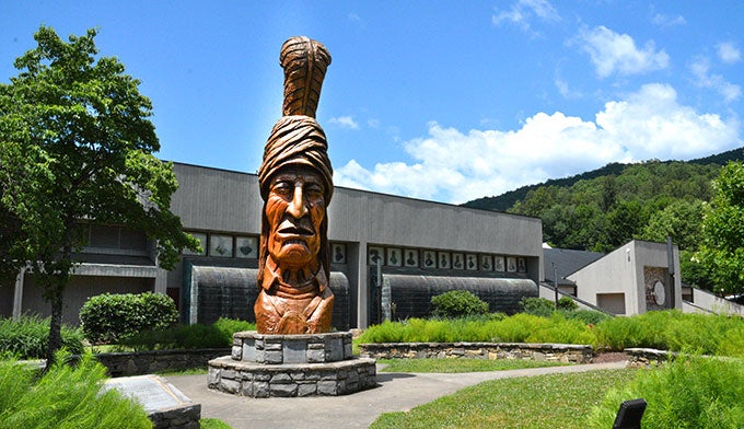NC-Museum-Cherokee-Indian-exterior-Sequoyah-sculpture_Gloria_680 The sculpture honoring Sequoyah, inventor of the Cherokee alphabet, outside the Museum of the Cherokee Indian was cut from a single sequoia tree log.