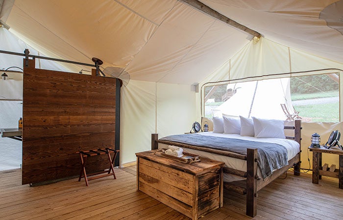 UnderCanvas-SM-interior_courtesy_700 Interior of a glamping tent at Under Canvas in the Gatlinburg area