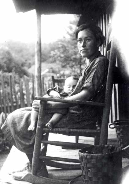SM-Molly-Ogle-rocks-baby-1928_NPSArchives_422x600 Molly McCarter Ogle rocks her daughter Mattie on the porch. This photo has become one of the most famous images created of mountain people in the…