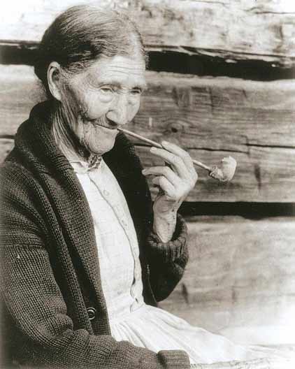 SM-Sophie-Campbell-Gatlinburg_NPSArchives_422x528 Sophie Campbell made clay pipes which she sold to people in the Gatlinburg area. Photo by Alan Rhinehart courtesy of NPS Archives