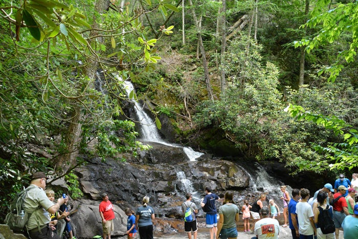 SM-Laurel-Falls-kids-wading_Gloria_700 Park Volunteer Mike Baker talks to a child playing at the base of Laurel Falls in Great Smoky Mountains National Park