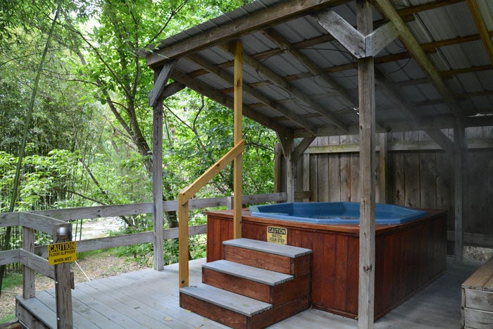 NC-Hot-Springs-Resort-tub-mister_Gloria_700 A private, spring-fed hot tub at the Hot Springs Resort overlooking the French Broad River